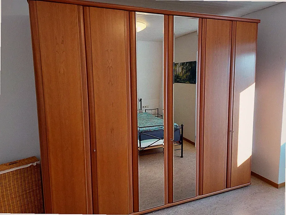 Kleiderschrank braun Holzoptik 270x60x230 cm 6 Drehtüren Spiegel